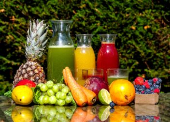 fruits and vegetable in clear glass jar